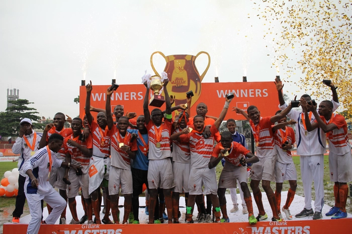 Captain Of St Finbarrs College Lifts The Trophy With Team Mates